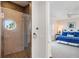 Bathroom with a walk-in shower and ocean view at 144 N Casey Key Rd, Osprey, FL 34229