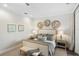 Calm bedroom with king-size bed and neutral color palette at 144 N Casey Key Rd, Osprey, FL 34229