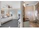 Bedroom with ensuite bathroom and ocean view at 144 N Casey Key Rd, Osprey, FL 34229