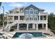 Stunning waterfront home with pool and patio at 144 N Casey Key Rd, Osprey, FL 34229