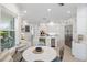 Spacious kitchen featuring a large island and stainless steel appliances at 144 N Casey Key Rd, Osprey, FL 34229