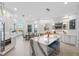 Open concept kitchen with expansive island and breakfast area at 144 N Casey Key Rd, Osprey, FL 34229