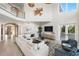 Spacious living area featuring high ceilings and a neutral color palette at 144 N Casey Key Rd, Osprey, FL 34229