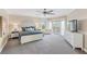 Spacious main bedroom with water views, large TV, and ample closet space at 144 N Casey Key Rd, Osprey, FL 34229