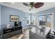 Spacious home office with desk, computer and water views at 144 N Casey Key Rd, Osprey, FL 34229