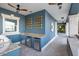 Long outdoor kitchen with stainless steel appliances at 144 N Casey Key Rd, Osprey, FL 34229