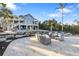 Relaxing patio with seating area and ocean views at 144 N Casey Key Rd, Osprey, FL 34229