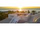 Rooftop terrace with ocean views and seating at sunset at 144 N Casey Key Rd, Osprey, FL 34229