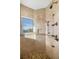 Spacious shower with tiled walls and dual shower heads at 144 N Casey Key Rd, Osprey, FL 34229