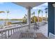 Balcony offering scenic water views and comfortable seating at 144 N Casey Key Rd, Osprey, FL 34229