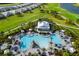 Resort-style pool and clubhouse with lush landscaping at 16127 Fortezza Dr, Bradenton, FL 34211