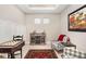 Game room with a chessboard, comfortable chairs, and a bar cabinet at 16127 Fortezza Dr, Bradenton, FL 34211