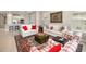 Bright living room featuring comfortable sofas, decorative pillows, and a stylish rug at 16127 Fortezza Dr, Bradenton, FL 34211