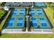 Aerial view of well-lit pickleball courts at 16127 Fortezza Dr, Bradenton, FL 34211