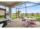 Relaxing screened patio overlooking a lake at 16127 Fortezza Dr, Bradenton, FL 34211