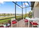 Enjoy this relaxing screened patio with lake view at 16127 Fortezza Dr, Bradenton, FL 34211