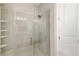 Large walk-in shower with glass enclosure and tile surround at 16127 Fortezza Dr, Bradenton, FL 34211