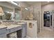 Spa-like Primary bathroom with granite vanity and large walk-in shower at 19451 Quisto St, Venice, FL 34293
