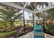 Relaxing enclosed patio overlooking a pond and lush landscaping at 19451 Quisto St, Venice, FL 34293