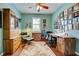Spacious home office featuring wood furniture and a large window at 19451 Quisto St, Venice, FL 34293
