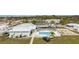 Community pool and recreation area with shuffleboard at 2107 Palma Sola Blvd # 59, Bradenton, FL 34209