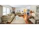 Spacious living room with beige sofas, patterned rug, and glass coffee table at 2107 Palma Sola Blvd # 59, Bradenton, FL 34209
