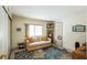 Small office space with a sofa, desk, and decorative rug at 2107 Palma Sola Blvd # 59, Bradenton, FL 34209