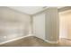 Bedroom with double door closet and view to another room at 21628 Lake Placid Way, Venice, FL 34293
