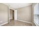 Bright bedroom with tile flooring and window at 21628 Lake Placid Way, Venice, FL 34293