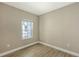 Bright bedroom with tile floors and neutral wall colors at 21628 Lake Placid Way, Venice, FL 34293