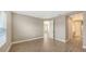 Bright bedroom with tile flooring and access to bathroom at 21628 Lake Placid Way, Venice, FL 34293