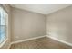 Spacious bedroom with tile floors and neutral wall colors at 21628 Lake Placid Way, Venice, FL 34293