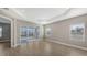 Gathering room with sliding glass doors and backyard access at 21628 Lake Placid Way, Venice, FL 34293