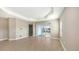 Spacious living room with tile floors and sliding glass doors leading to a patio at 21628 Lake Placid Way, Venice, FL 34293