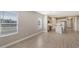 Bright living room features tile floors and an open floor plan at 21628 Lake Placid Way, Venice, FL 34293