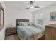 Guest bedroom with full bed, ceiling fan, and window coverings at 3206 Hilltop Cir, Bradenton, FL 34211