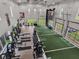 Aerial view of a large gym with turf area and weight machines at 3206 Hilltop Cir, Bradenton, FL 34211