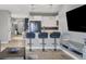 Modern kitchen with white cabinets, granite counters at 3206 Hilltop Cir, Bradenton, FL 34211