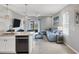 Living room with sectional sofa and kitchen island view at 3206 Hilltop Cir, Bradenton, FL 34211