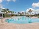 Resort-style pool with lounge chairs and cabanas at 3206 Hilltop Cir, Bradenton, FL 34211