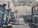Modern weight room with various strength training equipment at 3206 Hilltop Cir, Bradenton, FL 34211