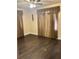 Spacious bedroom with dark hardwood floors and neutral walls at 3301 N Avenida Republica De Cuba, Tampa, FL 33605