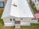 Property exterior, roof, and small storage shed visible at 3333 26Th E Ave # 1241, Bradenton, FL 34208