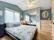 Bedroom with a queen bed and mirrored closet at 3333 26Th E Ave # 1241, Bradenton, FL 34208