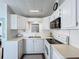 White cabinets and modern appliances in this clean kitchen at 3333 26Th E Ave # 1241, Bradenton, FL 34208