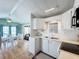 Clean kitchen with white cabinets and modern appliances at 3333 26Th E Ave # 1241, Bradenton, FL 34208