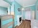 Cozy living room with fireplace and built-in shelving at 3333 26Th E Ave # 1241, Bradenton, FL 34208