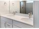 Double vanity with quartz countertop and modern faucets at 3425 Dryden St, North Port, FL 34288