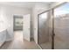 Bright bathroom with shower and access to bedroom at 3425 Dryden St, North Port, FL 34288