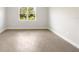Bright bedroom with tile flooring and a window at 3425 Dryden St, North Port, FL 34288